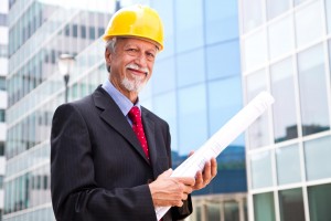 A man holding building plan